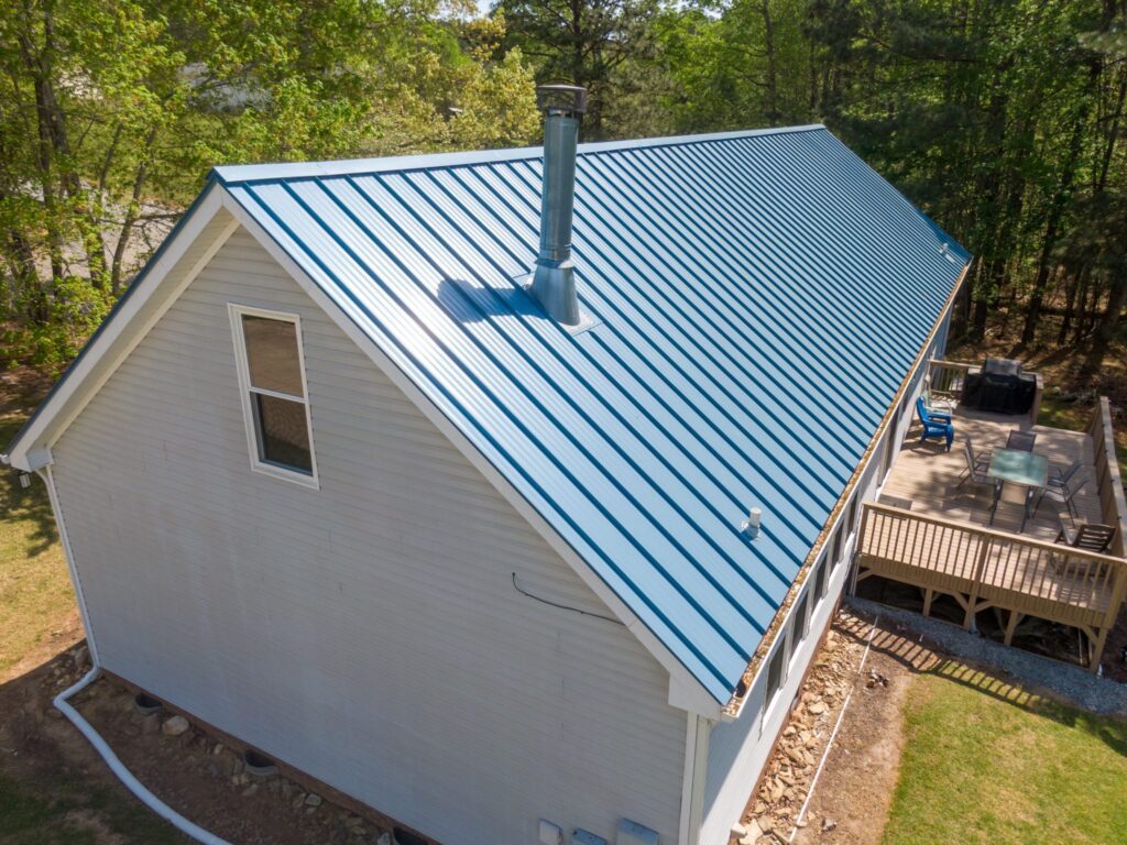 Closeup of a small home using 5V crimp metal roofing