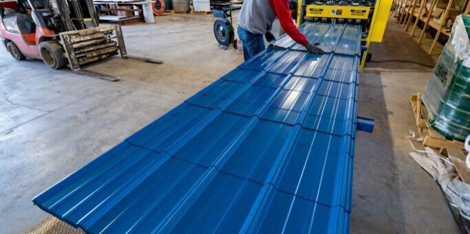 Watson Metals_Feb 16_22-102 Photo of man handling PBR Panels