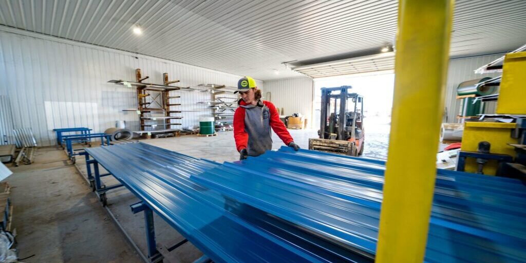 Watson Metals_Feb 16_22-108 Man working with metal in a warehouse